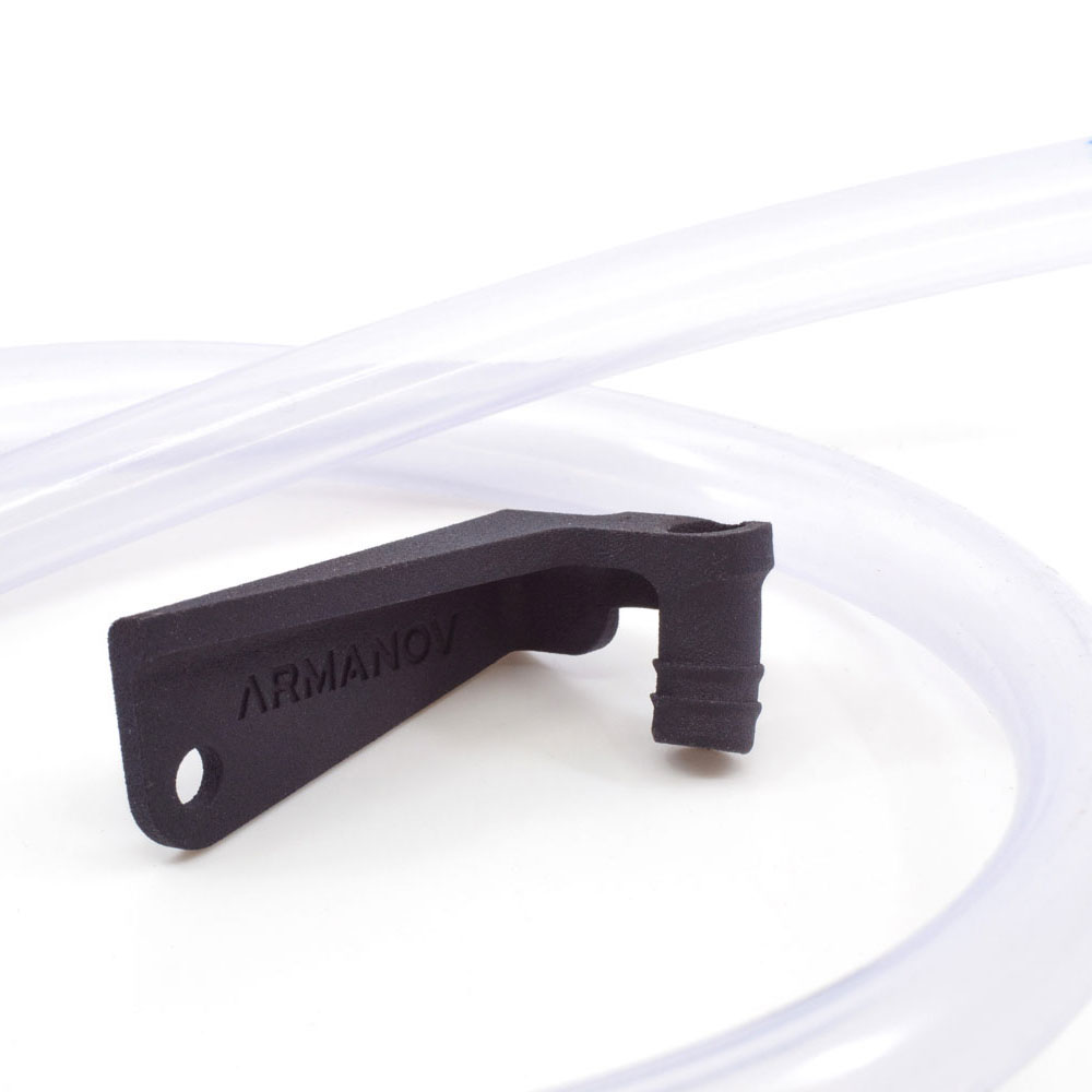 ARMANOV Spent Primer Chute for Dillon 1050-1100 ensures a clean workspace by routing spent primers through a transparent tube into a waste container.