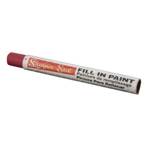 LACQUER STIK Color Fill Paint Stick enhances engraved markings on firearms with easy application, quick hardening, and durable, vibrant colors for lasting visibility.